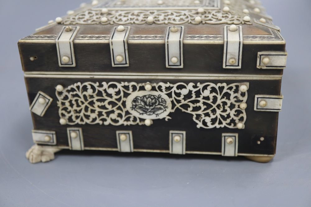 A 19th century Southern Indian horn and ivory mounted trinket box, height 7.5cm and a similar card case